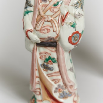 A Pair of Porcelain Figures